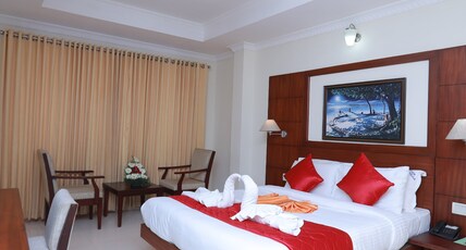 HOTEL PENINSULA THRISSUR Room Type - Deluxe Movie Theme