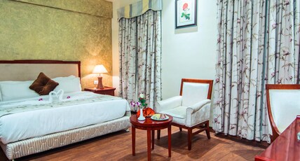 Club Paraiso Room Type - Deluxe King Bed Room Club Paraiso Room Type - Deluxe King Bed Room