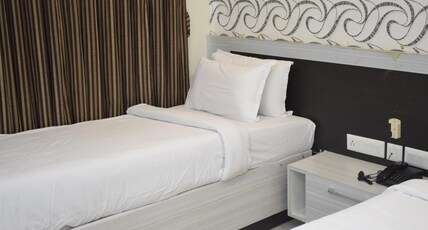 Hotel Aksharadha Room Type - Deluxe Twin Bed  Ac Room