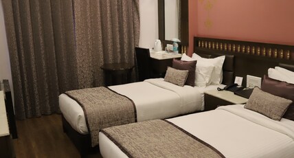 The Gandhi International Room Type - Luxury Room