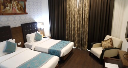 The Byke Select - Suraj Plaza Pure Veg Hotel | (Pan India Pure Veg Hotel Chain) Room Type - Super Deluxe Twin Bed Room
