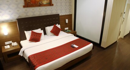 The Byke Select - Suraj Plaza Pure Veg Hotel | (Pan India Pure Veg Hotel Chain) Room Type - Super Deluxe King Bed Room