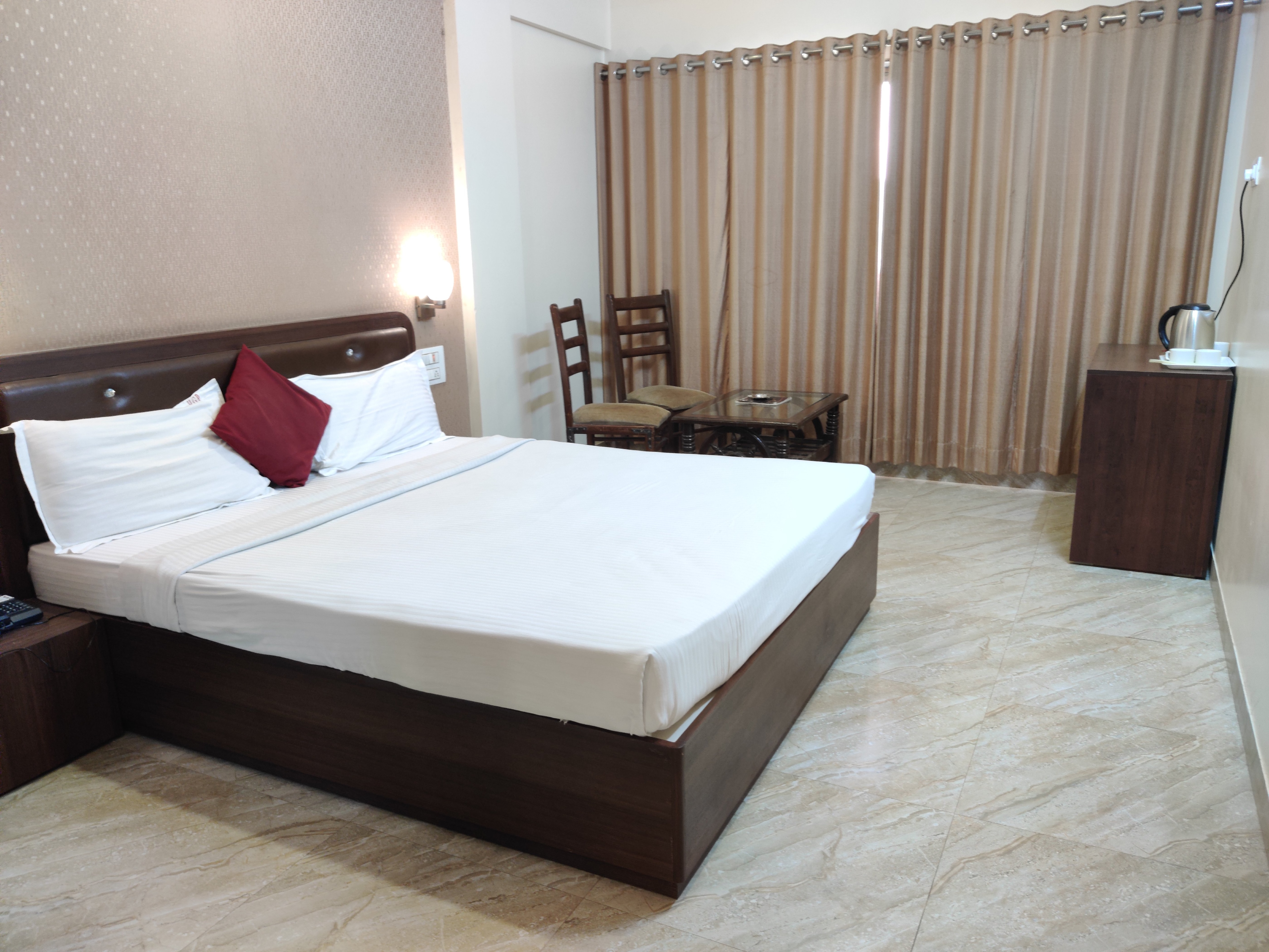 Hotel Gulmohar Pride - Tap to explore photos