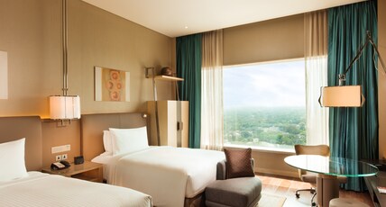 Conrad Pune- Luxury by Hilton Room Type - Double Queen Deluxe Room with Bathtub Conrad Pune- Luxury by Hilton Room Type - Double Queen Deluxe Room with Bathtub