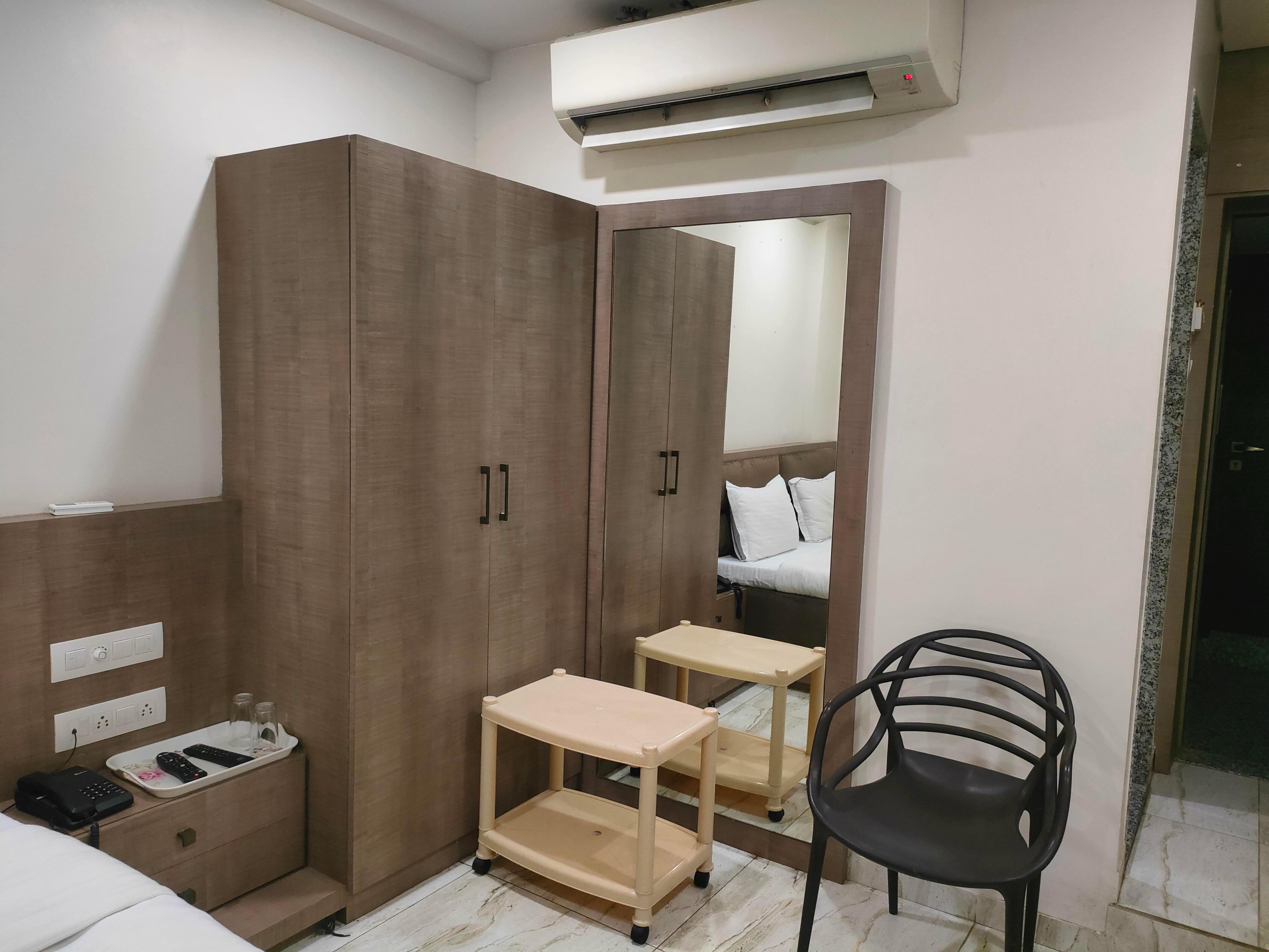 Hotel Navkar Residency - Tap to explore photos