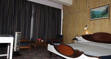 Hotel Holiday Home, Shimla (HPTDC ) Room Type - Double Bed Room Cozy Deluxe