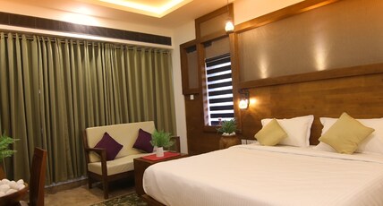 Silver Green Holiday Enclaves Room Type - Deluxe Room with Balcony AC Silver Green Holiday Enclaves Room Type - Deluxe Room with Balcony AC