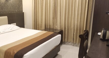 Hotel Deepam Room Type - Deluxe AC Double Bed Room