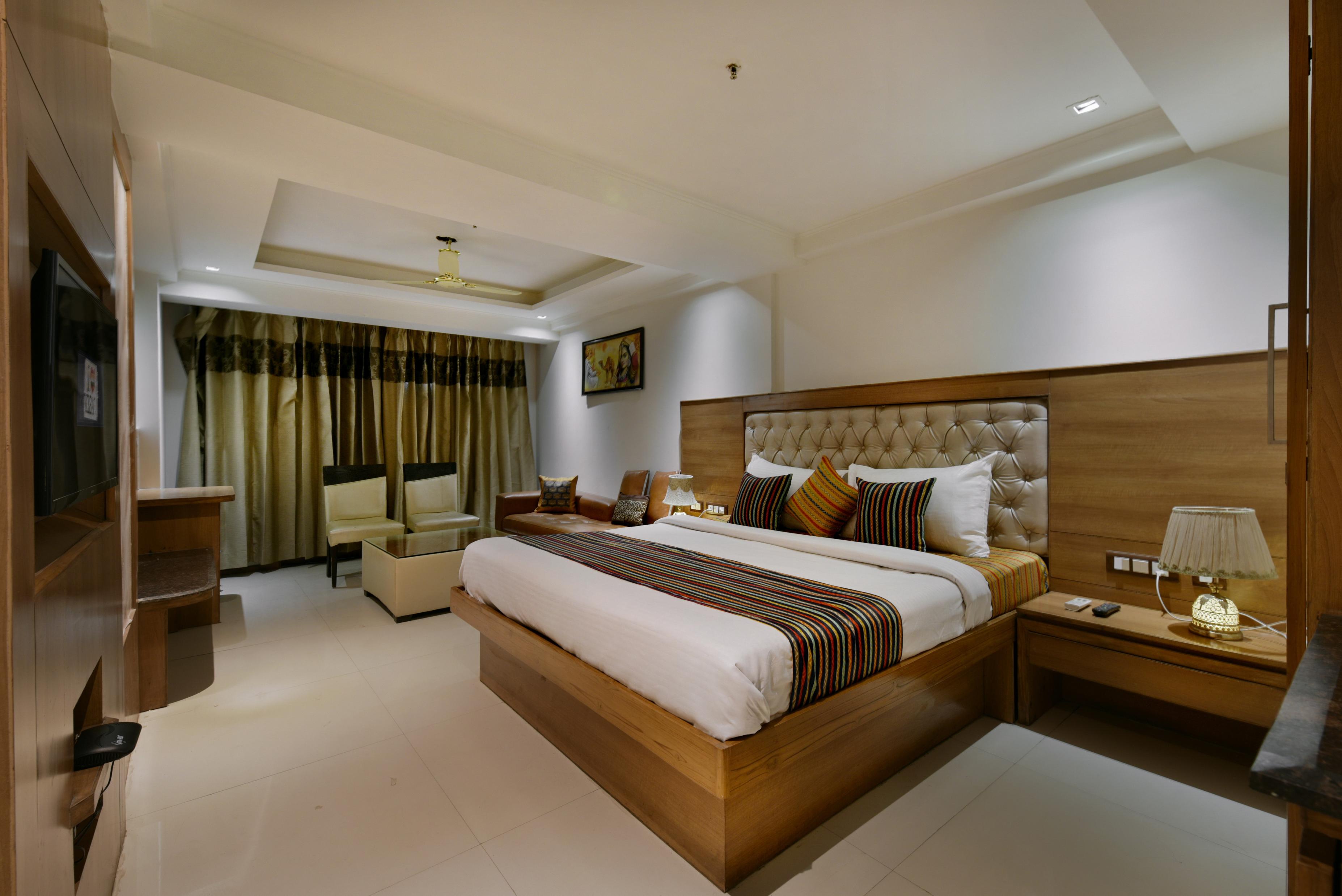 Hotel Lotus Paradise By Golden Key At Parker Mall Near TDI Kundli - Tap to explore photos