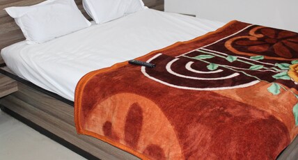 Hotel Vasundhara Room Type - Deluxe Room