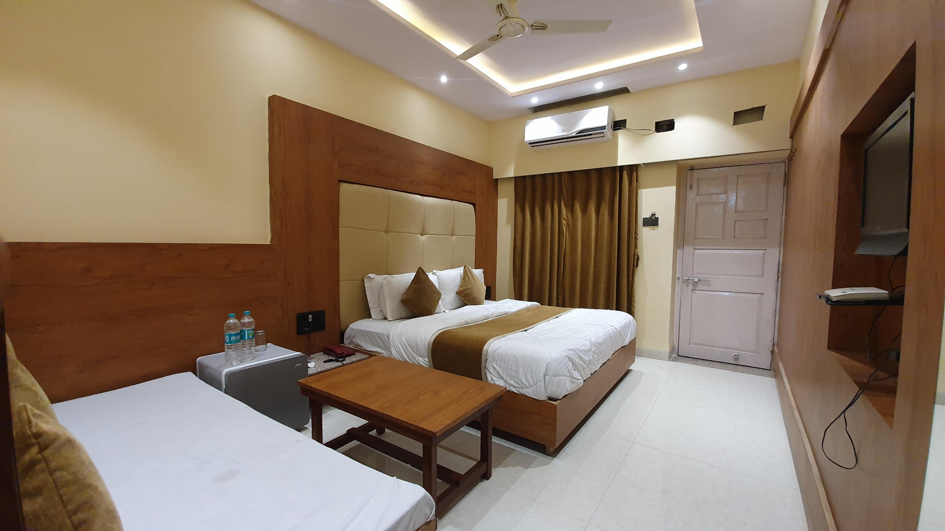 Hotel Golden Veena - Tap to explore photos
