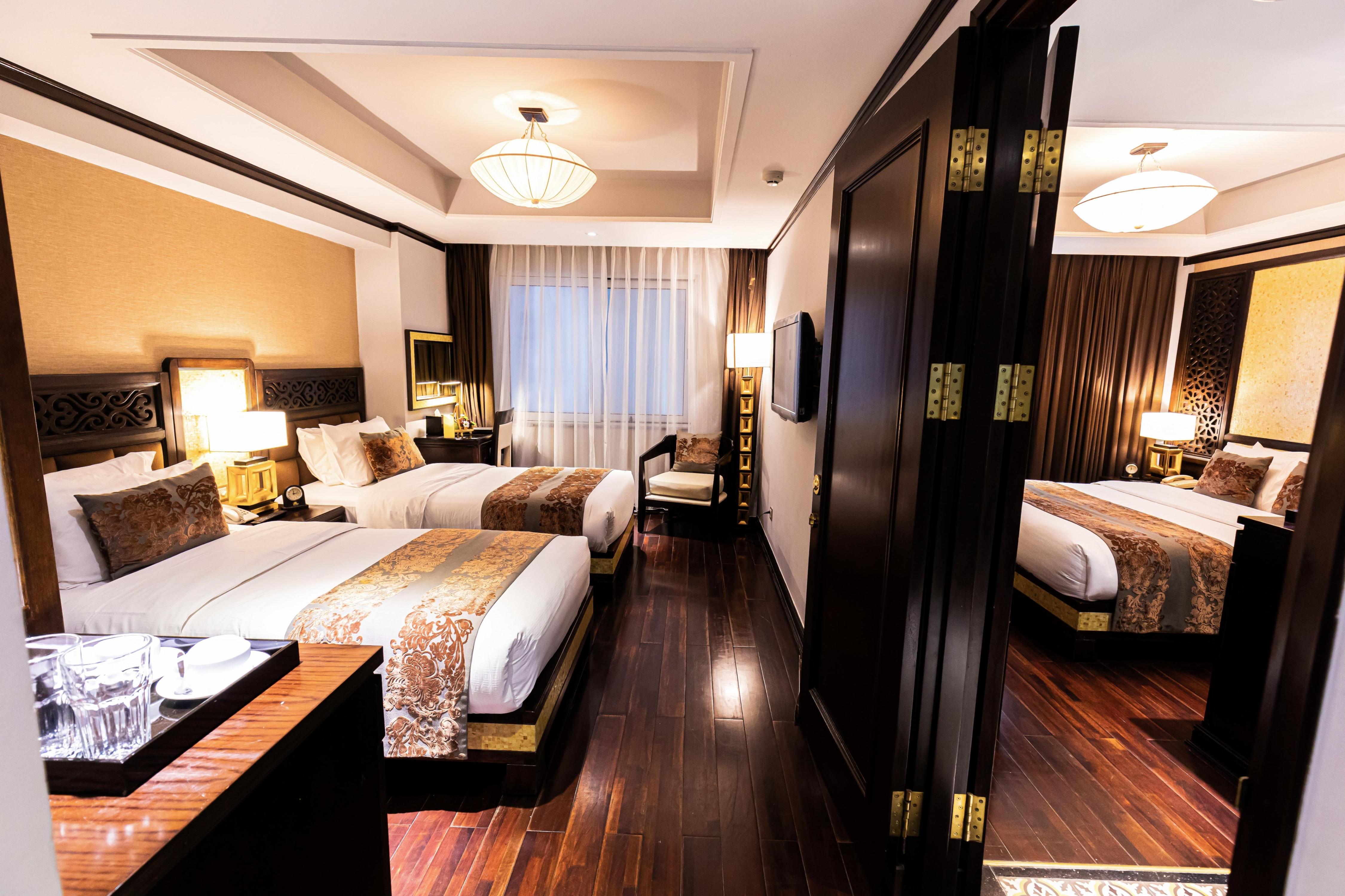 Golden Lotus Luxury Hotel - Tap to explore photos