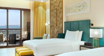 DoubleTree by Hilton Resort & Spa Marjan Island Room Type - Two Queen Bed Bay Club Room with Sea View DoubleTree by Hilton Resort & Spa Marjan Island Room Type - Two Queen Bed Bay Club Room with Sea View