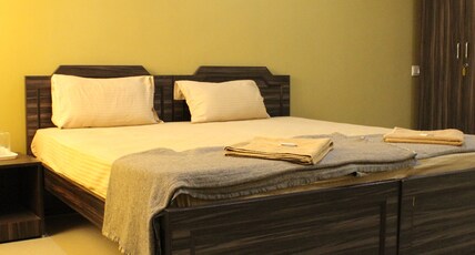 Chandran Hyline | Rooms in an Apartment Room Type - Deluxe Room