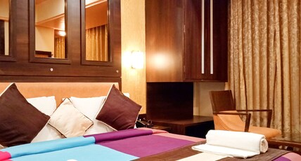 HOTEL POONAM Room Type - Deluxe Couple AC Room