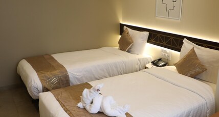 The Ambience Hotel Room Type - Deluxe Room  (Twin Bed)