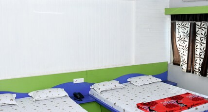 Hotel Om Shiva Room Type - 4 BEDROOM AC Hotel Om Shiva Room Type - 4 BEDROOM AC