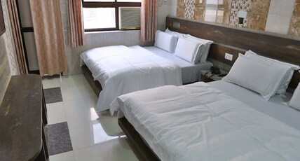 Hotel Satyam Ajmer- Just 50 Meters from Ajmer Sharif. Room Type - Deluxe AC Four Bed