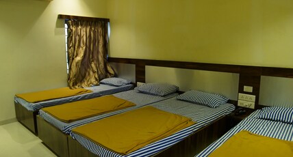 Hotel Apana with Sea face pure veg Restaurant Room Type - Deluxe Four Bed AC Room