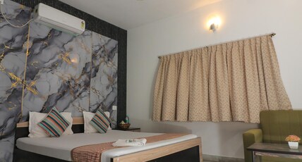Sai International Guest House Room Type - Deluxe Room
