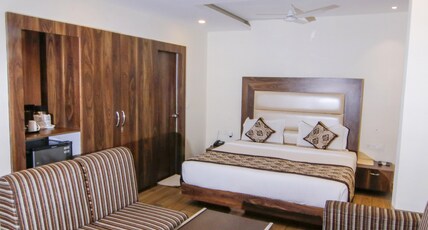 Radical Palace Room Type - Suite Room, 24 hours check-in and check out , 15 Percent Off On Food Bill Radical Palace Room Type - Suite Room, 24 hours check-in and check out , 15 Percent Off On Food Bill