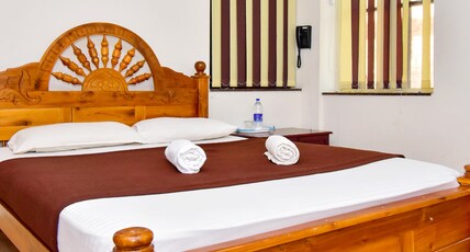 HARE KRISHNA INN Room Type - Deluxe Room