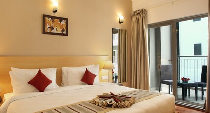 Starlit Suites Kochi Room Type - Deluxe Suite With Kitchenette Living Area and Balcony Starlit Suites Kochi Room Type - Deluxe Suite With Kitchenette Living Area and Balcony