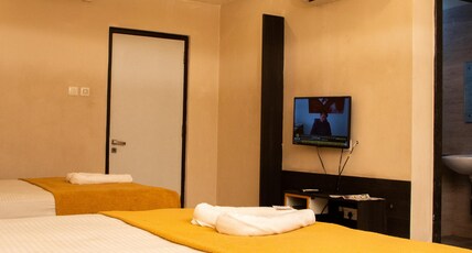 Hotel Swagath Room Type - DELUXE 4 BEDED NON AC