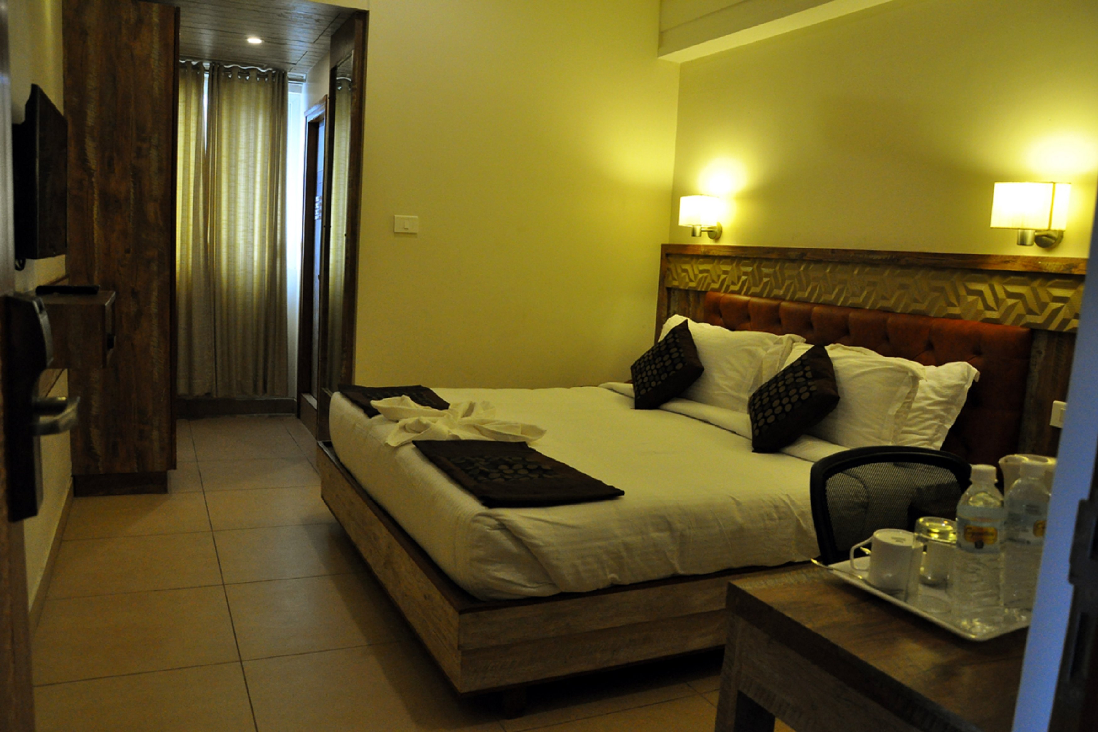 Hotel Thanmayi Inn Room Type - Deluxe room