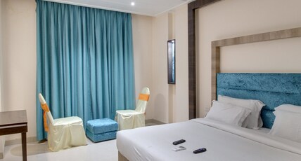 RED CARLTON BANQUETS AND HOTEL Room Type - Deluxe Rooms