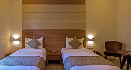 THE GRAND HIGHNESS Room Type - Standard Room Twin Sharing