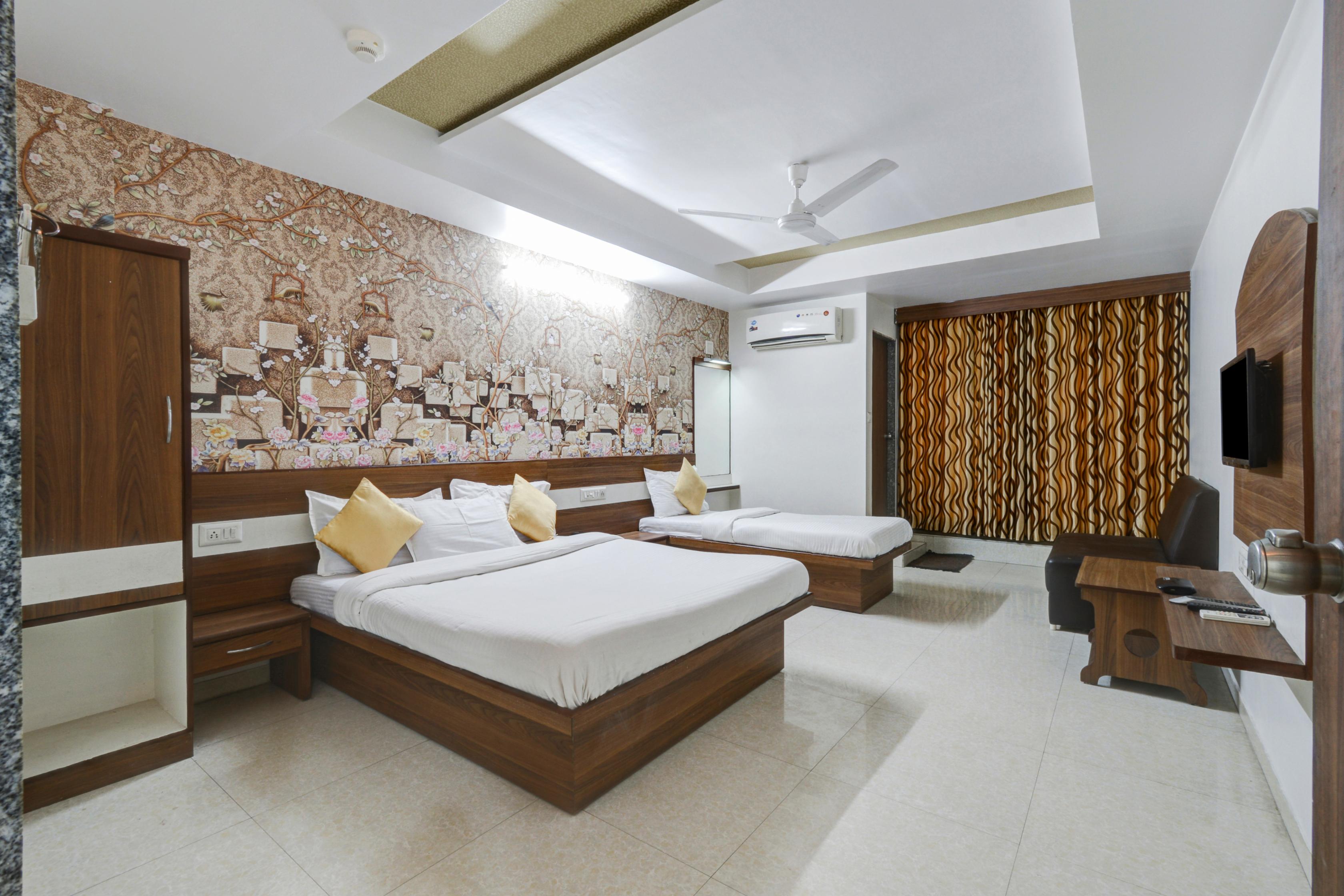 Hotel Tirupati Room Type - Deluxe Triple Room (3X) (NRI and Foreigner not allowed)