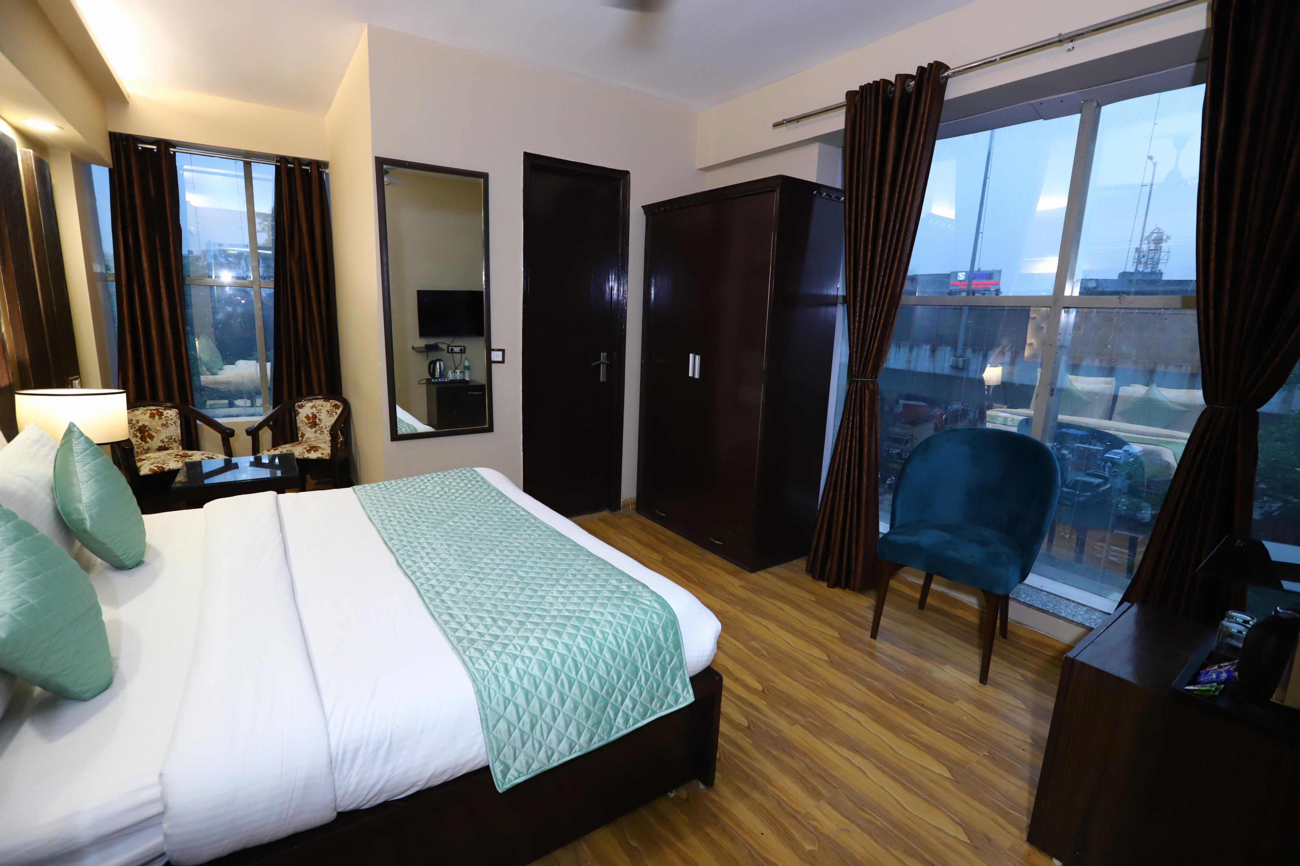 Rooms of Hotel Palm Grand @ Naraina New Delhi