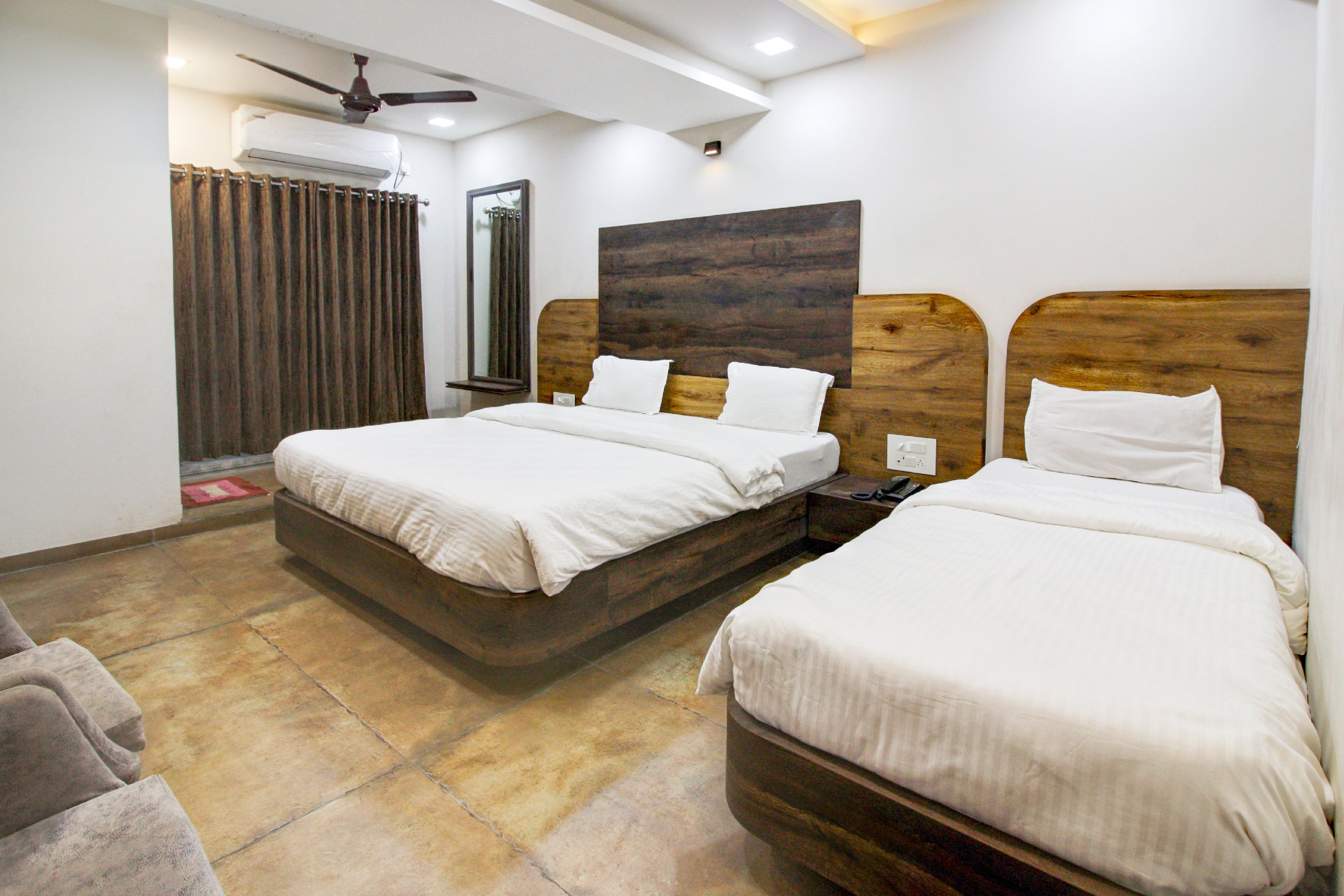 Hotel Rajdhani - Tap to explore photos