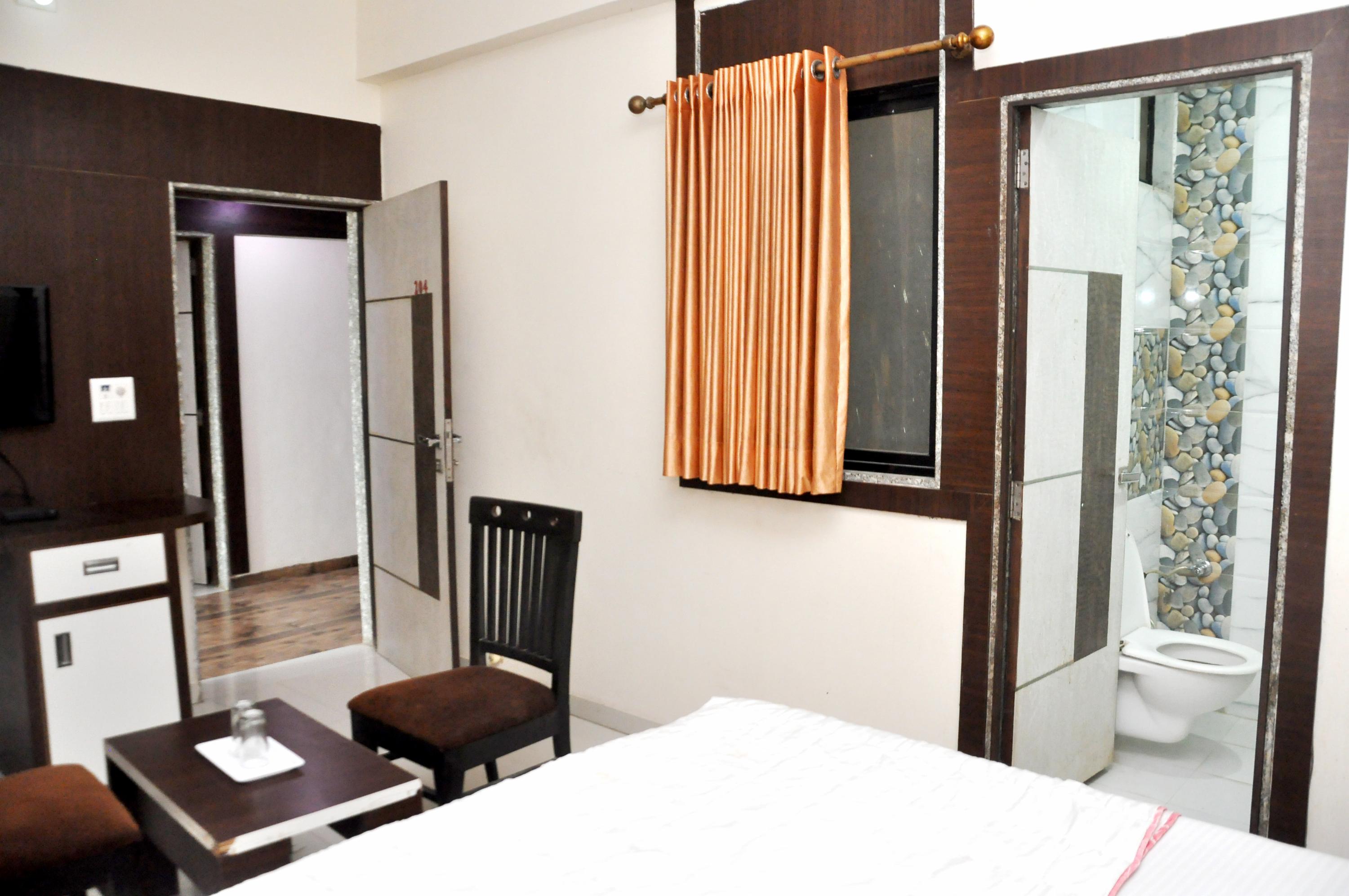 Hotel Sankalp Room Type - NON AC DEUXE ROOM