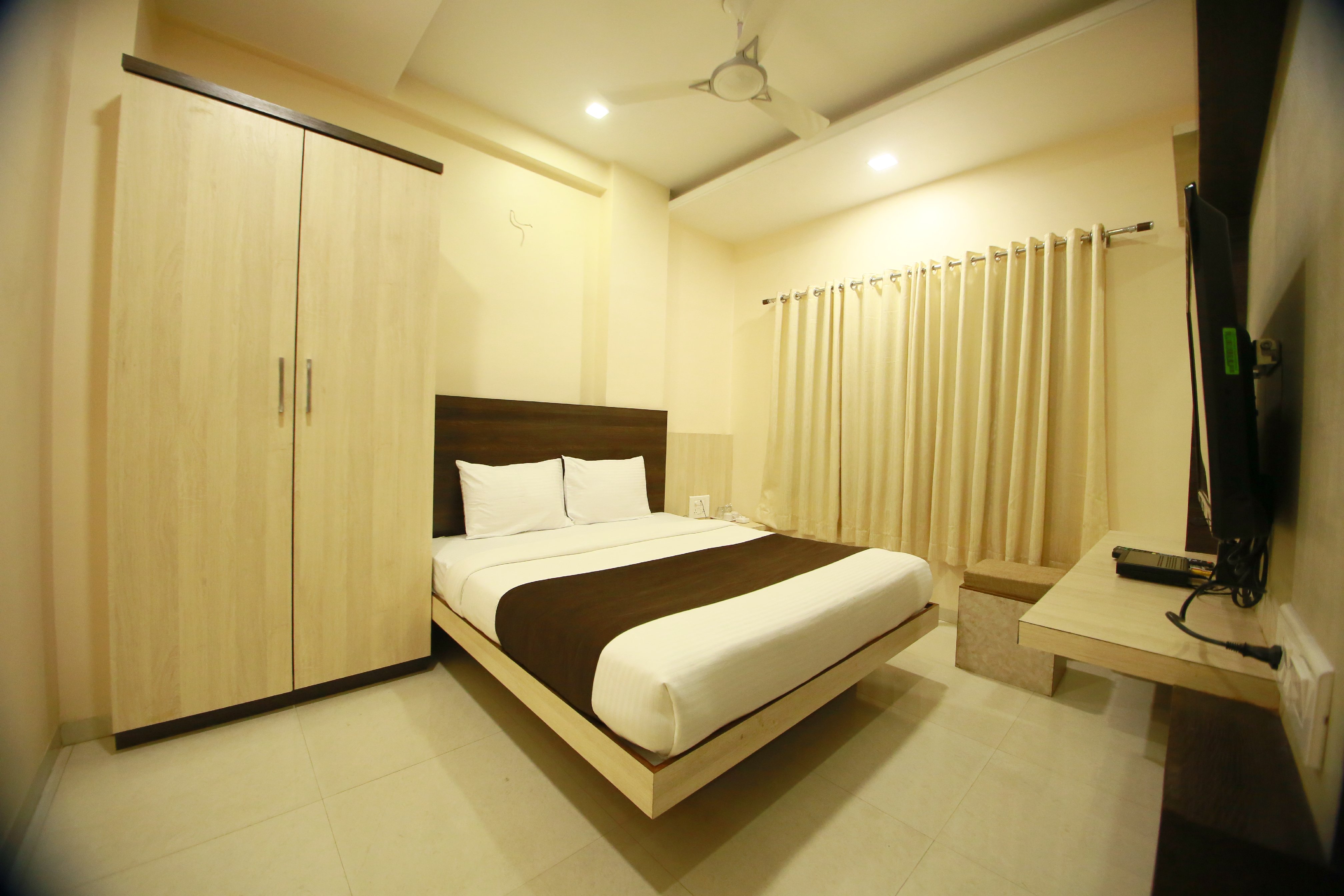 Hotel Madhuri Executive - Tap to explore photos