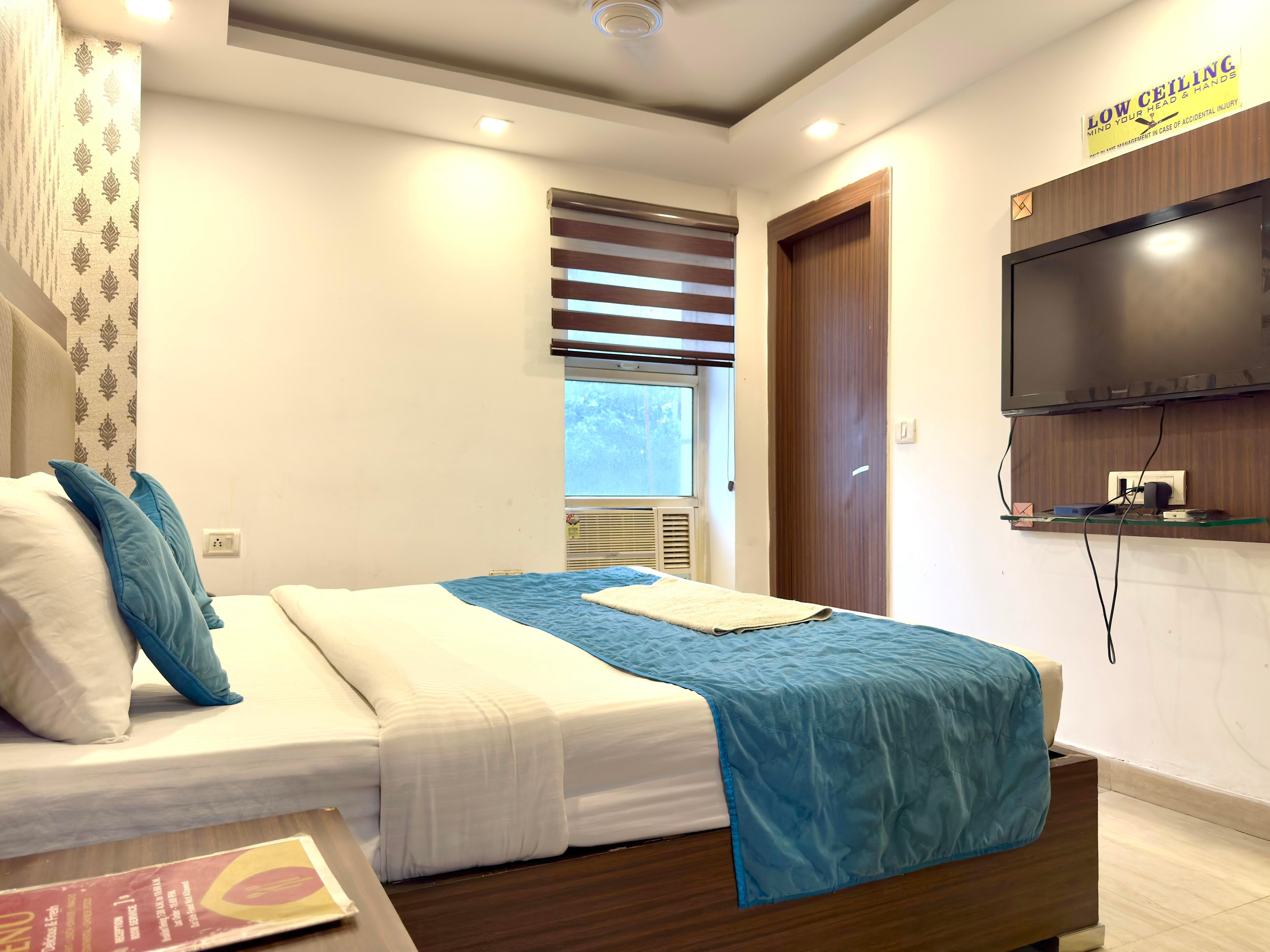 Hotel Pawan Plaza at Karol Bagh Room Type - Compact double or Twin bed AC Room ( Local ID also accepted)