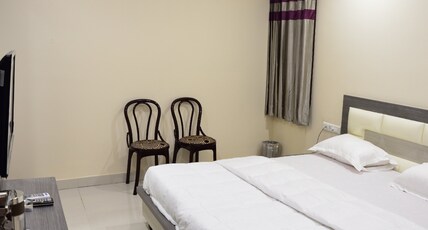 Kamals Inn Room Type - Deluxe Room