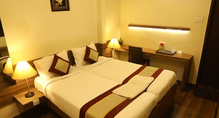 NESTLAY ROOMS AMBATTUR. Room Type - Deluxe Room
