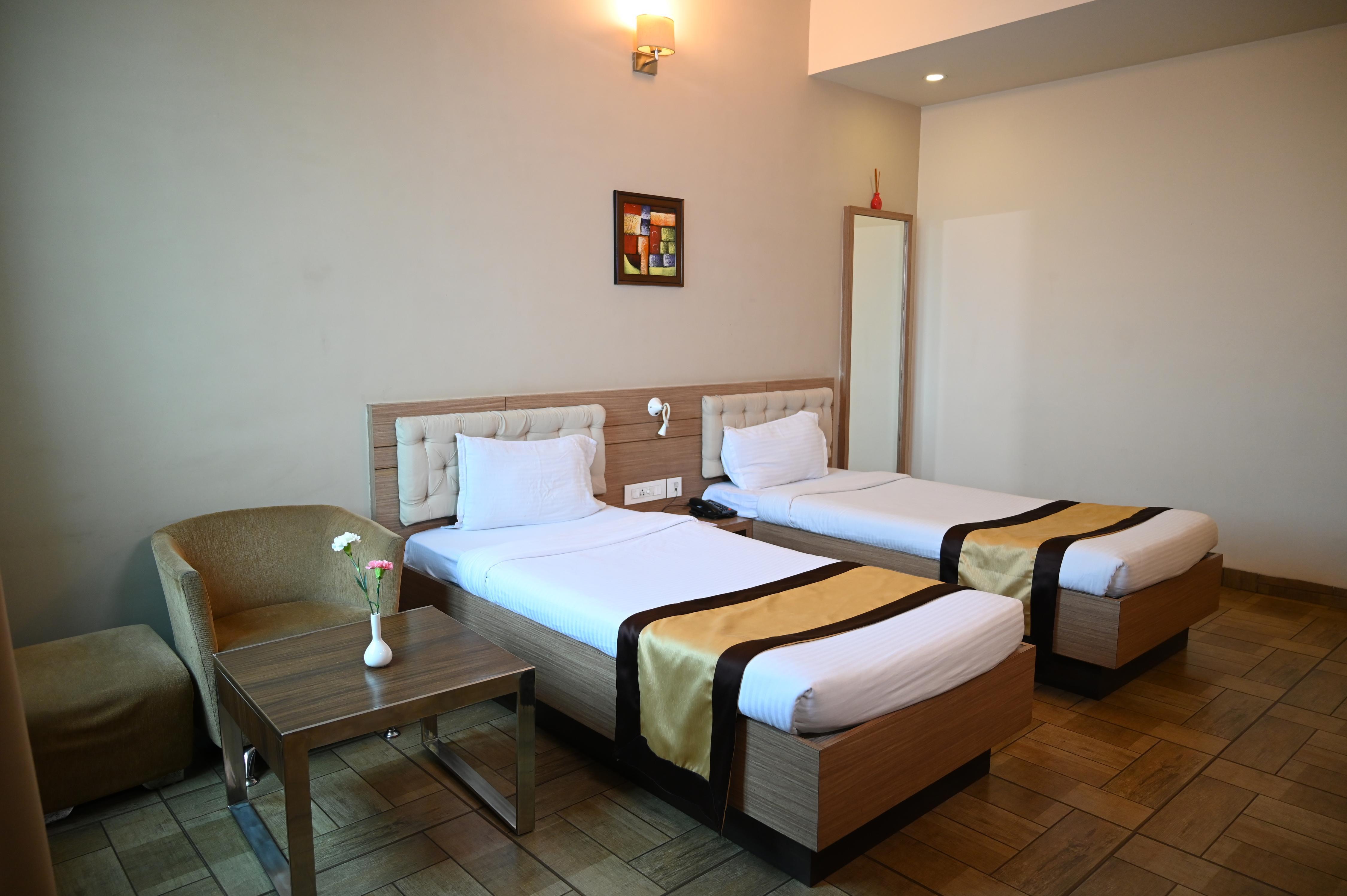 HOTEL GENISTA INN Room Type - Deluxe AC Room with Work Desk