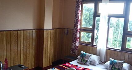 Khi gha thang Room Type - Deluxe room.
