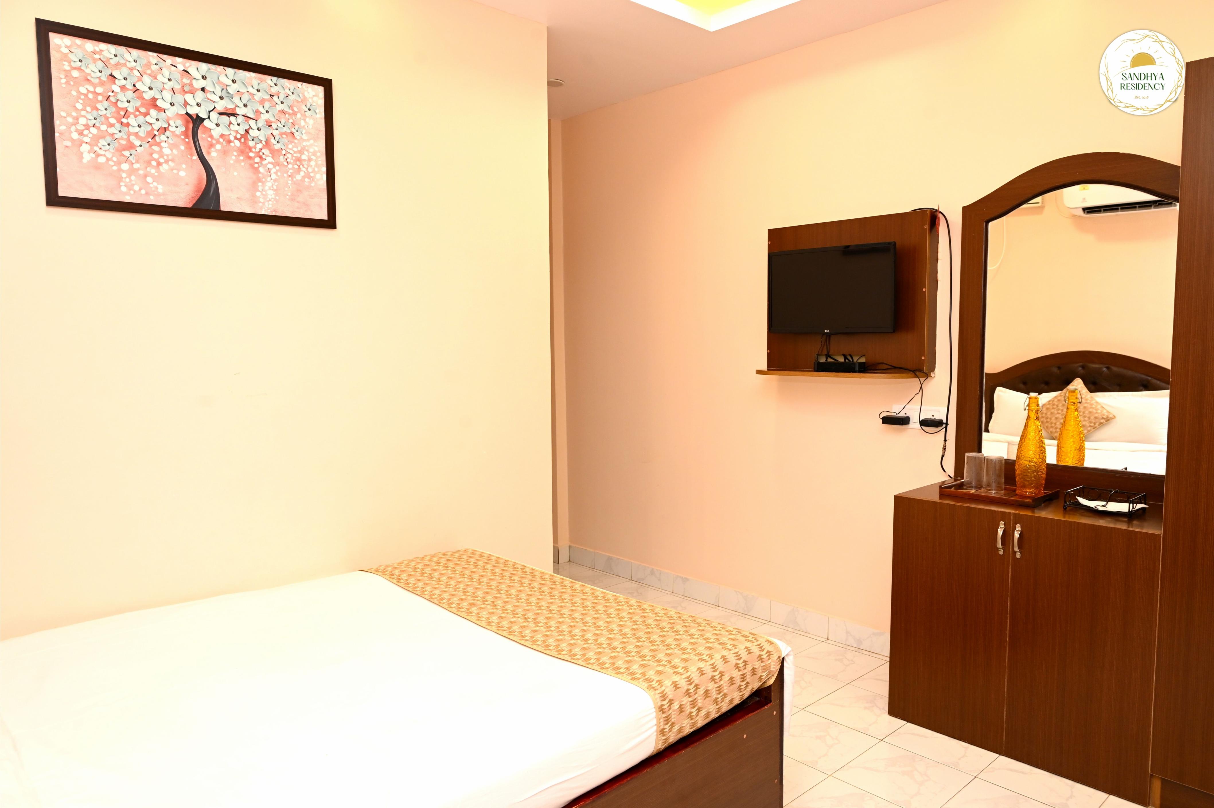 Sandhya Residency | Rooms & Wi-Fi - Tap to explore photos