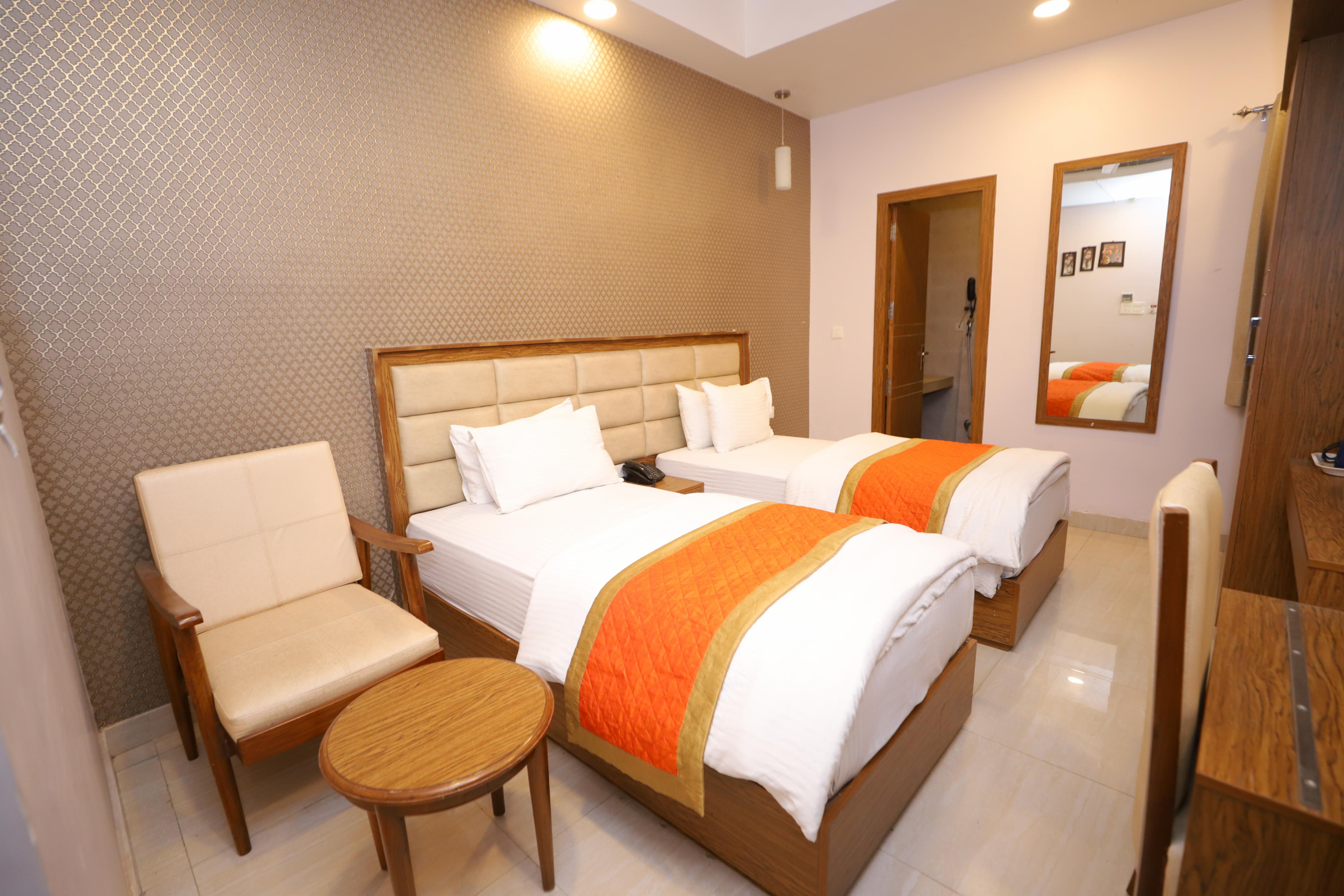 Hotel JM Vistaraa Room Type - Deluxe Room (Twin Bed)