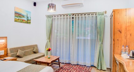 Hotel Malas Room Type - Premium AC Room with Balcony (Double Bed + Sofa Bed)