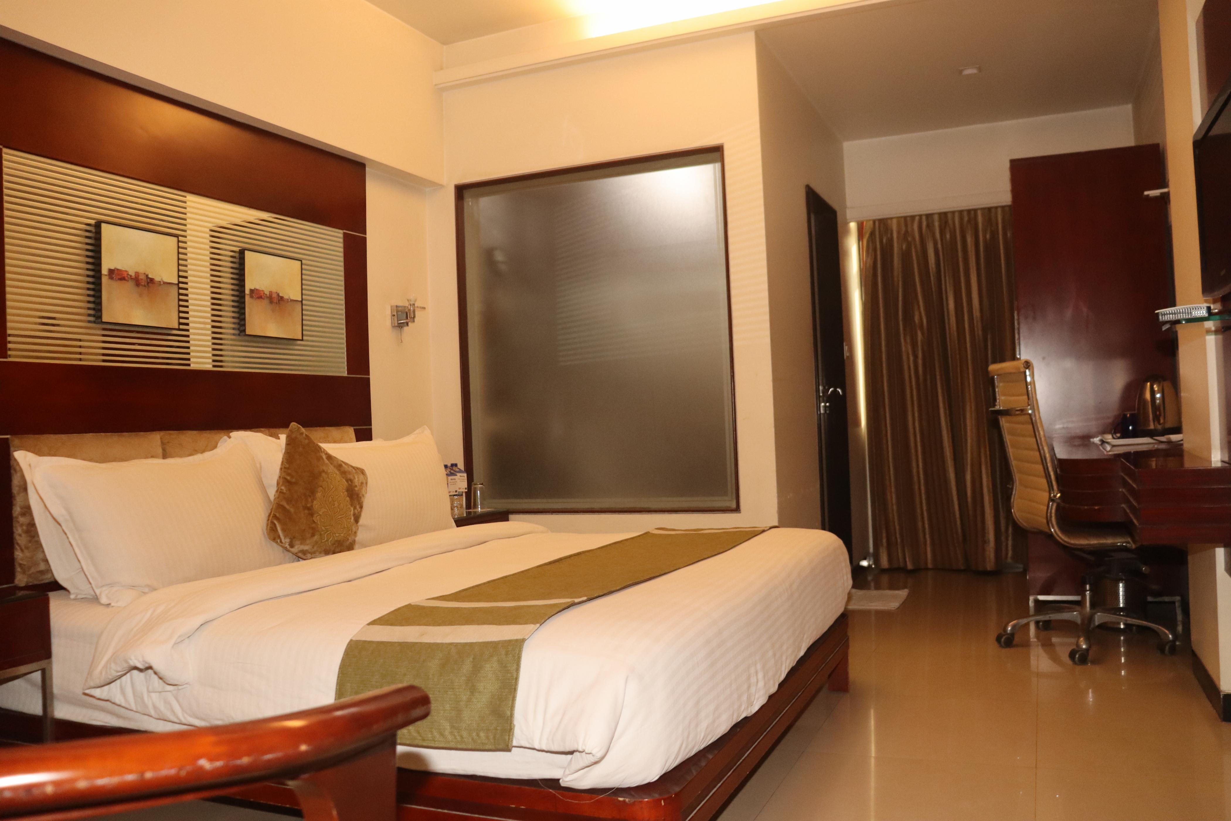 Kyriad Hotel Indore by OTHPL - Tap to explore photos