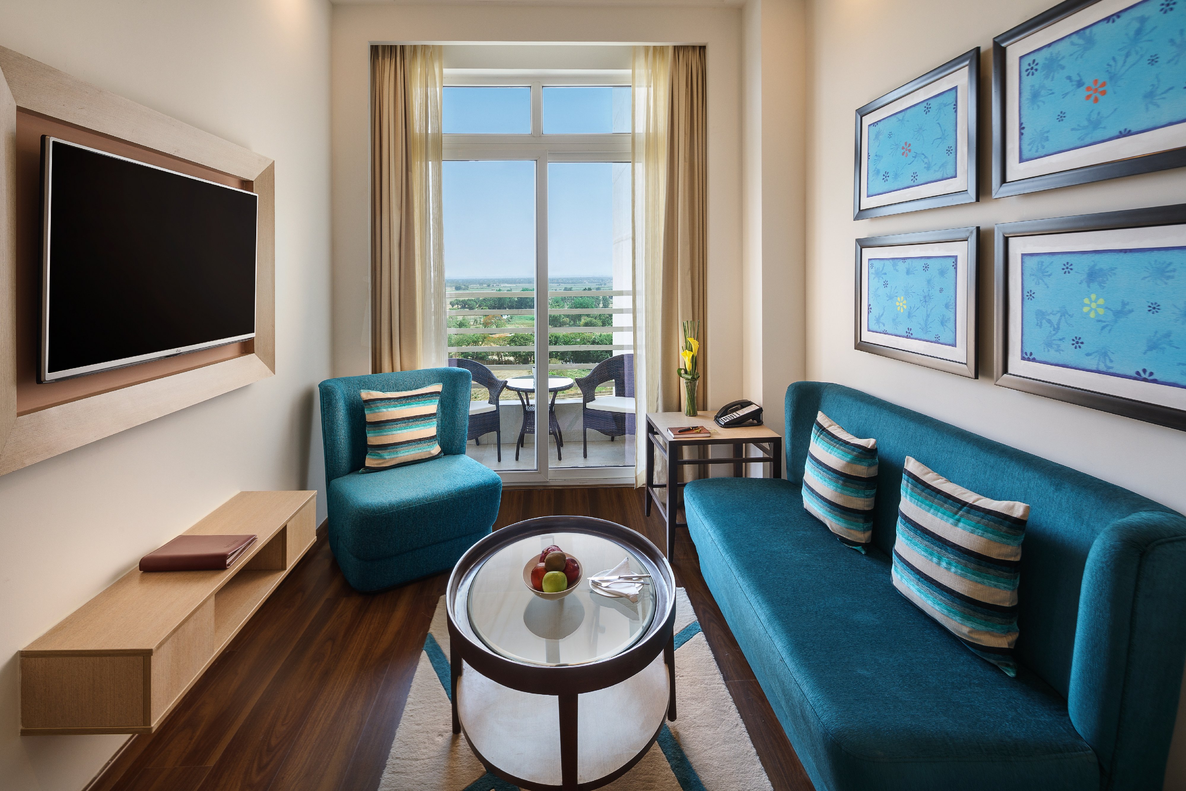 Sandal Suites Op. by Lemon Tree Hotels - Tap to explore photos
