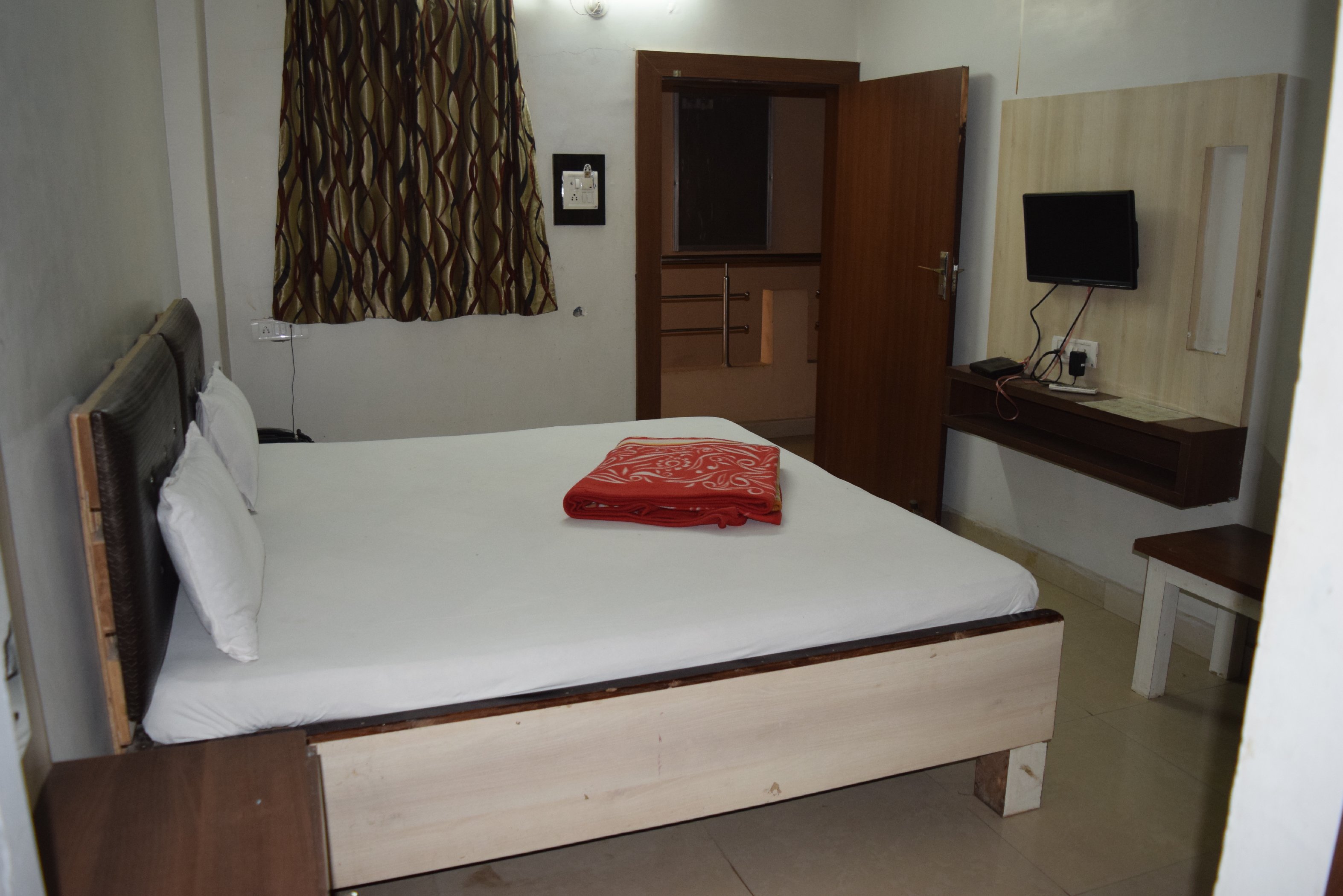 Hotel CM residency Room Type - Deluxe Air Cooled  Room (With Ducting)