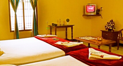 Hotel Ganga Palace Room Type - Deluxe Triple AC Room Hotel Ganga Palace Room Type - Deluxe Triple AC Room