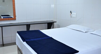 Sreeniketanam Lodge Room Type - Economy Double Bed Non AC Room (Check-in 8 AM, Check-out 6 AM) Sreeniketanam Lodge Room Type - Economy Double Bed Non AC Room (Check-in 8 AM, Check-out 6 AM)