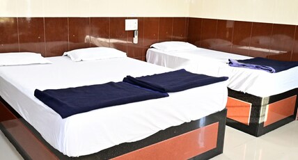 Sreeniketanam Lodge Room Type - Economy Three Bed Non AC Room (Check-in 8 AM, Check-out 6 AM) Sreeniketanam Lodge Room Type - Economy Three Bed Non AC Room (Check-in 8 AM, Check-out 6 AM)